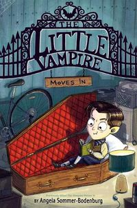 Cover image for The Little Vampire Moves in