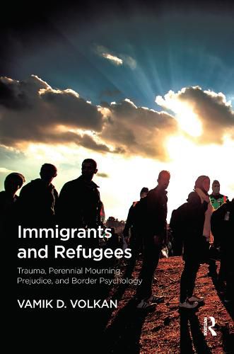 Immigrants and Refugees: Trauma, Perennial Mourning, Prejudice, and Border Psychology