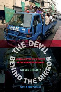 Cover image for The Devil behind the Mirror: Globalization and Politics in the Dominican Republic