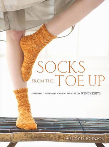 Cover image for Socks from the Toe Up: Essential Techniques and Patterns from Wendy Knits