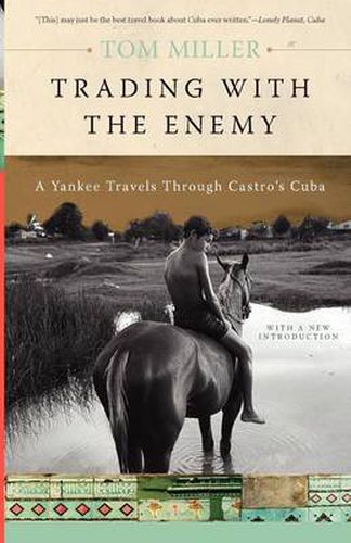 Cover image for Trading with the Enemy: A Yankee Travels Through Castro's Cuba