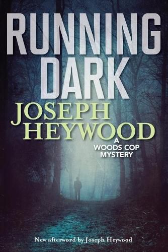 Cover image for Running Dark: A Woods Cop Mystery