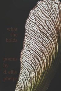 Cover image for what she holds