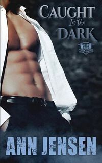 Cover image for Caught in the Dark