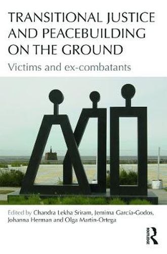 Cover image for Transitional Justice and Peacebuilding on the Ground: Victims and ex-combatants