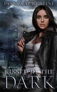 Cover image for Kissed by the Dark: Ollie Wit Book 3