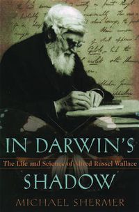 Cover image for In Darwin's Shadow: The Life and Science of Alfred Russel Wallace - A Biographical Study on the Psychology of History