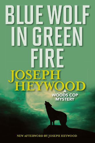 Cover image for Blue Wolf In Green Fire: A Woods Cop Mystery