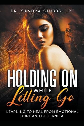 Cover image for Holding On While Letting Go