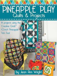Cover image for Pineapple Play Quilts & Projects: 14 Projects Using the Creative Grids(R) 10-Inch Pineapple Trim Tool