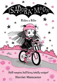 Cover image for Isadora Moon Rides a Bike