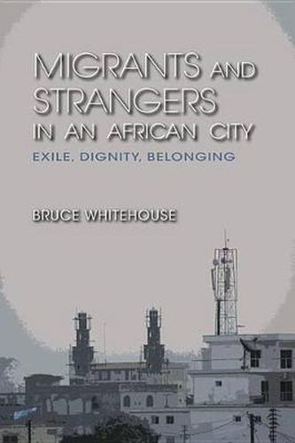Cover image for Migrants and Strangers in an African City: Exile, Dignity, Belonging