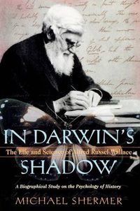 Cover image for In Darwin's Shadow: The Life and Science of Alfred Russel Wallace: A Biographical Study on the Psychology of History