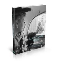 Cover image for Lucy Comes Home: A Photographic Journey