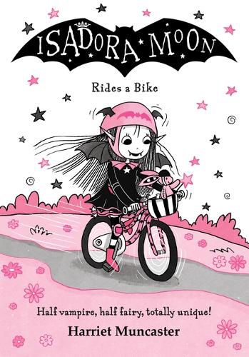 Cover image for Isadora Moon Rides a Bike