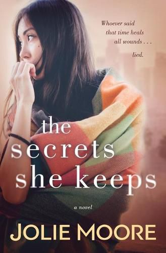 Cover image for The Secrets She Keeps