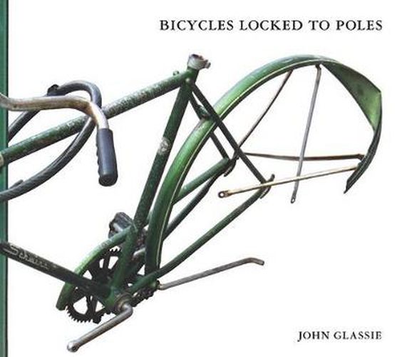 Cover image for Bicycles Locked to Poles
