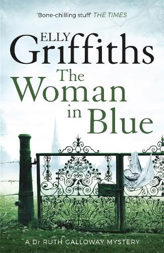 Cover image for The Woman In Blue: The Dr Ruth Galloway Mysteries 8