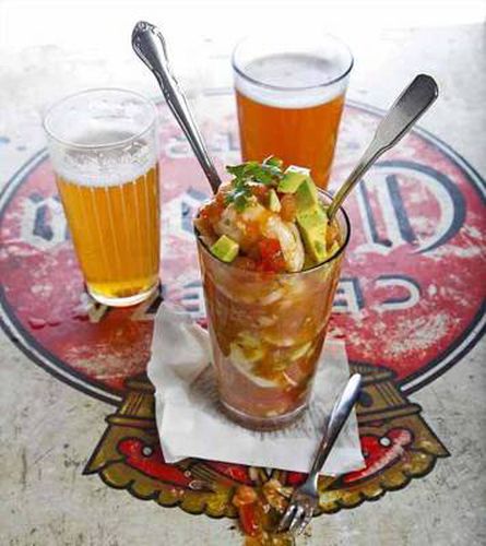 Cover image for The Hot Sauce Cookbook: Turn Up the Heat with 60+ Pepper Sauce Recipes