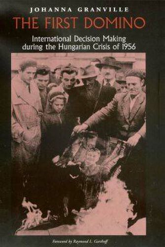 Cover image for The First Domino: International Decision Making during the Hungarian Crisis of 1956