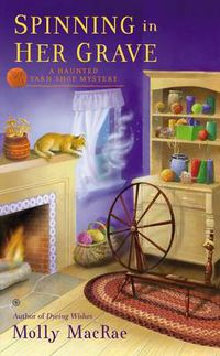 Cover image for Spinning in Her Grave: A Haunted Yarn Shop Mystery