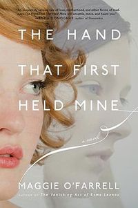 Cover image for The Hand That First Held Mine