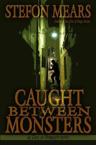 Cover image for Caught Between Monsters