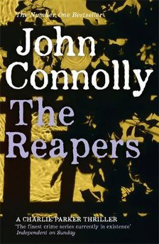 Cover image for The Reapers: A Charlie Parker Thriller: 7