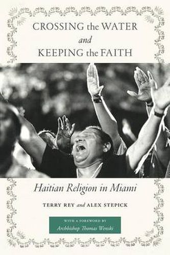 Cover image for Crossing the Water and Keeping the Faith: Haitian Religion in Miami