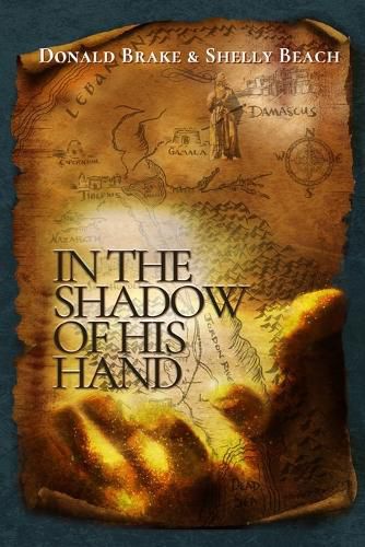 Cover image for In The Shadow of HIs Hand