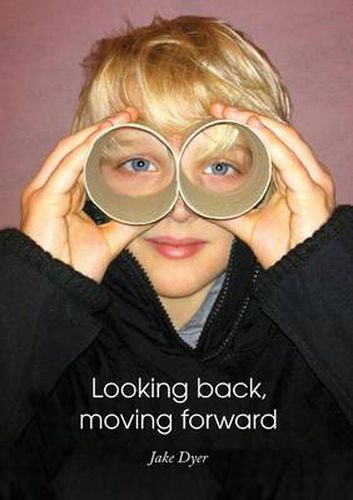 Cover image for Looking back, moving forward