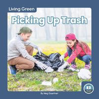 Cover image for Living Green: Picking Up Trash