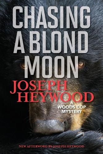 Cover image for Chasing a Blond Moon: A Woods Cop Mystery