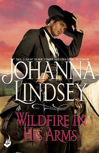 Cover image for Wildfire In His Arms: A dangerous gunfighter falls for a beautiful outlaw in this compelling historical romance from the legendary bestseller