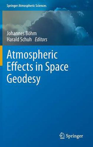 Atmospheric Effects in Space Geodesy