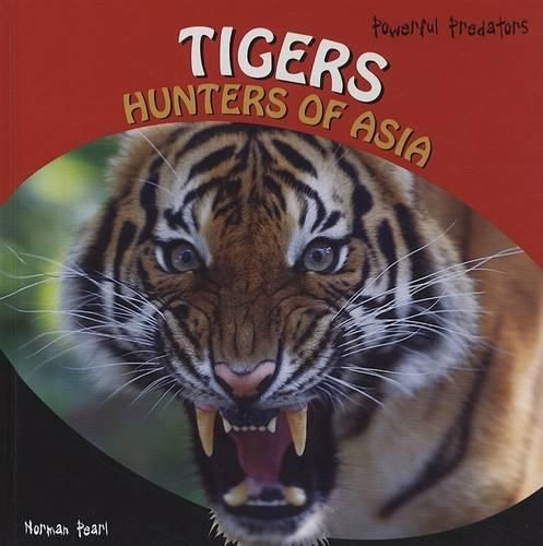 Cover image for Tigers: Hunters of Asia