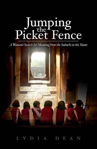 Cover image for Jumping the Picket Fence: A Woman's Search for Meaning from the Suburbs to the Slums