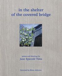 Cover image for in the shelter of the covered bridge