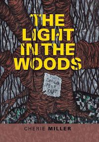 Cover image for The Light in the Woods