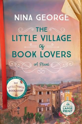 Cover image for The Little Village of Book Lovers
