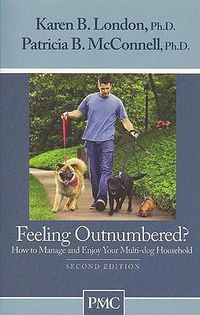 Cover image for Feeling Outnumbered?: How to Manage and Enjoy Your Multi-Dog Household