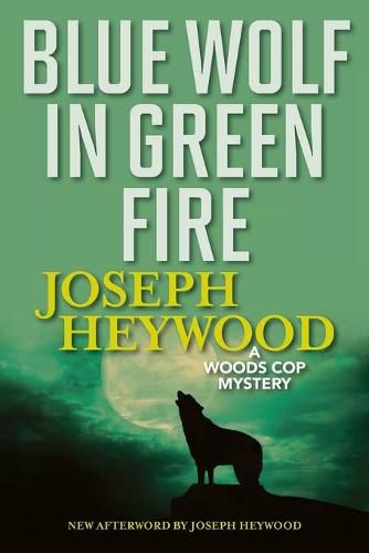 Cover image for Blue Wolf In Green Fire: A Woods Cop Mystery