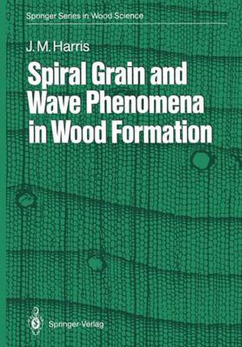 Spiral Grain and Wave Phenomena in Wood Formation