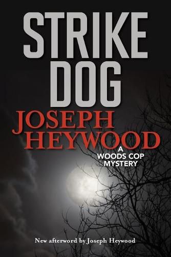 Cover image for Strike Dog: A Woods Cop Mystery