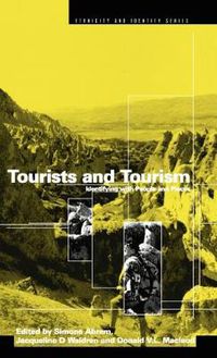 Cover image for Tourists and Tourism: Identifying with People and Places