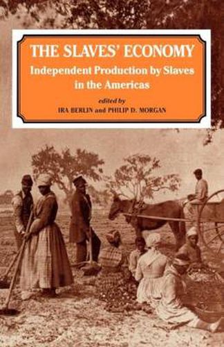 Cover image for The Slaves' Economy: Independent Production by Slaves in the Americas