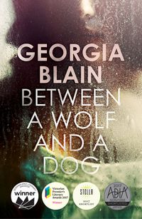 Cover image for Between a Wolf and a Dog