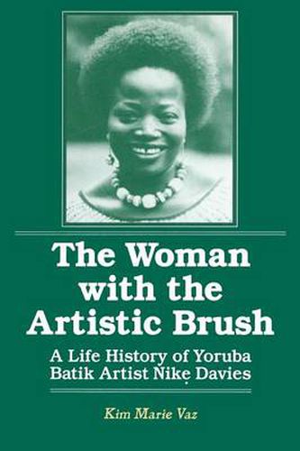 Cover image for The Woman with the Artistic Brush: Life History of Yoruba Batik Nike Olaniyi Davies