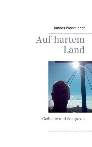 Cover image for Auf hartem Land: Gedichte und Songtexte