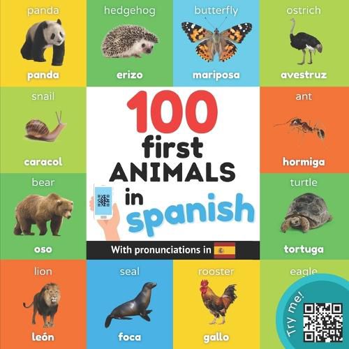 Cover image for 100 first animals in spanish: Bilingual picture book for kids: english / spanish with pronunciations